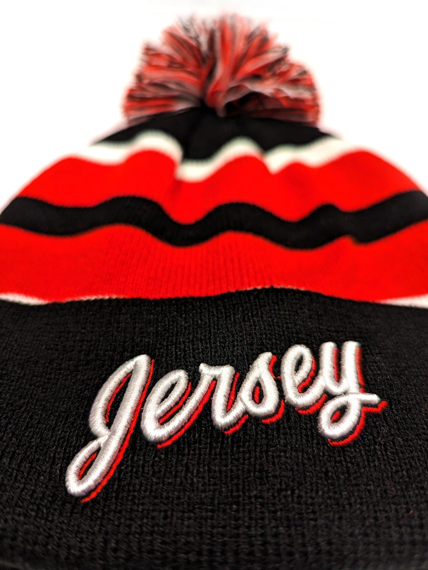 Jersey Hockey Beanie Hat - Alternate Black and Red Color with Pom Pom and Emboidered 3D Puff Script Comfortable and Fun Fan Gift.