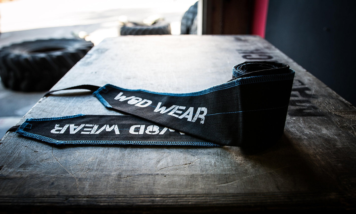 WOD Wear Wrist Wraps for Powerlifting, Strength Training, Bodybuilding, Cross Training, Olympic Weightlifting, Yoga Support - One Size Fits All (Black/Blue Stitch)